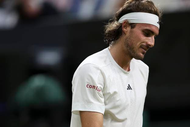 (230707) -- LONDON, July 7, 2023 -- Stefanos Tsitsipas of Greece reacts during the men s singles second round match between Andy Murray of Britain and Stefanos Tsitsipas of Greece at Wimbledon tennis Championship in London, Britain, on July 6, 2023. ) (SP)BRITAIN-LONDON-TENNIS-WIMBLEDON-DAY 4 HanxYan 