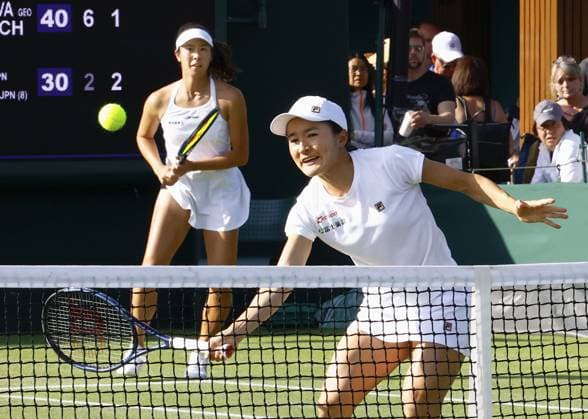 Tennis: Wimbledon championships Japan s Ena Shibahara (back) and Shuko Aoyama play their first-round women s doubles match against Oksana Kalashnikova of Georgia and Iryna Shymanovich of Belarus at the Wimbledon tennis tournament in London on July 6, 2023.  A14AA0001655043P  