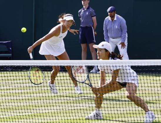 Tennis: Wimbledon championships Japan s Ena Shibahara (L) and Shuko Aoyama play their first-round women s doubles match against Oksana Kalashnikova of Georgia and Iryna Shymanovich of Belarus at the Wimbledon tennis tournament in London on July 6, 2023.  A14AA0001655044P  