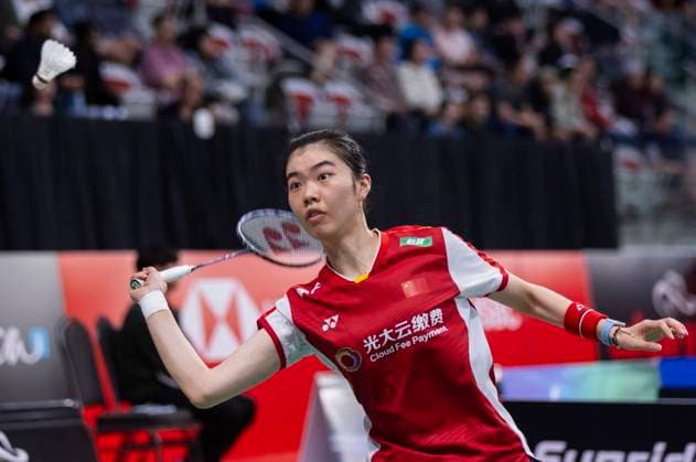 (230707) -- CALGARY, July 7, 2023 -- Gao Fangjie of China returns a shot during the second round of women s singles match against Jenjira Stadelmann of Switzerland at the 2023 Canada Open badminton tournament in Calgary, Canada, on July 6, 2023. (Photo by Xinhua) (SP)CANADA-CALGARY-BADMINTON-CANADA OPEN-WOMEN S SINGLES ZouxZheng 