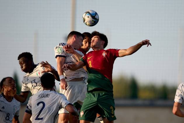 TA™QALI, MALTA JULY 6: Portugal Under-19 national soccer player Gabriel Bras (top back, partially hidden) about to head the ball and score during the UEFA European Under-19 Championship 2022 23 Group A match between Portugal and Italy at the Centenary Stadium on July 6, 2023, in Ta™ Qali, Malta. UEFA European Under-19 Championship 2022 23 Final Tournament in Malta UEFA_U19_2023