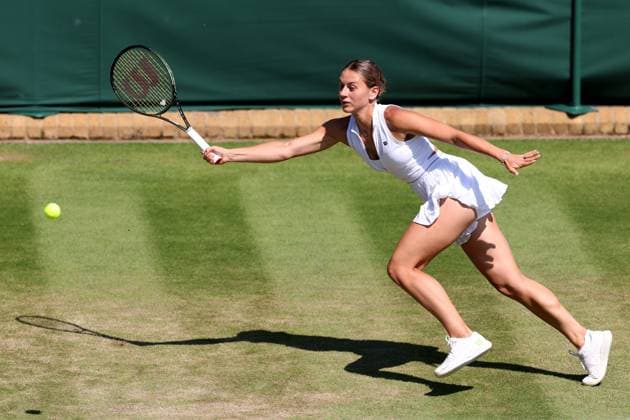 7th July 2023; All England Lawn Tennis and Croquet Club, London, England: Wimbledon Tennis Tournament; Marta Kostyuk returns the serve from Paula Badsoa  ActionPlus12527906 ShaunxBrooks