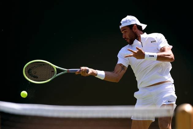 7th July 2023; All England Lawn Tennis and Croquet Club, London, England: Wimbledon Tennis Tournament; Matteo Berrettini plays a forehand shot to Alex De Minaur  ActionPlus12527912 ShaunxBrooks