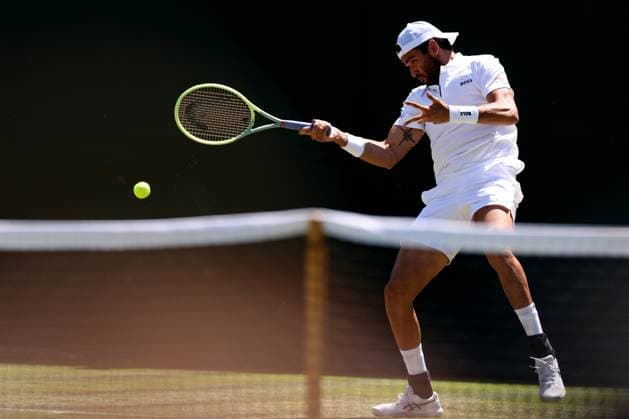 7th July 2023; All England Lawn Tennis and Croquet Club, London, England: Wimbledon Tennis Tournament; Matteo Berrettini plays a forehand shot to Alex De Minaur  ActionPlus12527913 ShaunxBrooks