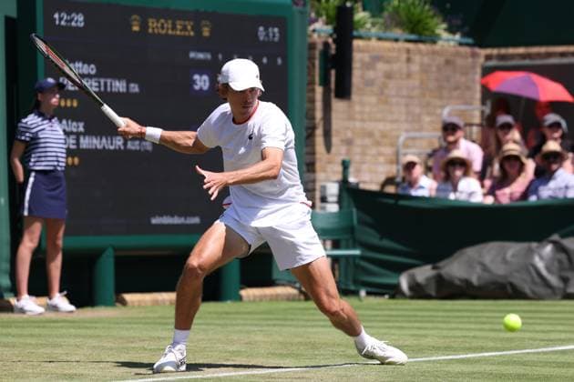7th July 2023; All England Lawn Tennis and Croquet Club, London, England: Wimbledon Tennis Tournament; Alex De Minaur plays a forehand shot to Matteo Berrettini  ActionPlus12527917 ShaunxBrooks