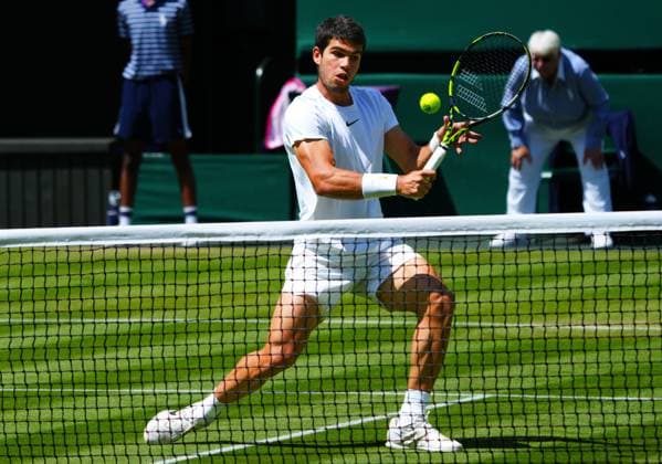 Mandatory Credit: Photo by Javier Garcia Shutterstock (13995928am) Carlos Alcaraz during his second round match Wimbledon Tennis Championships, Day 5, The All England Lawn Tennis and Croquet Club, London, UK - 07 Jul 2023 Wimbledon Tennis Championships, Day 5, The All England Lawn Tennis and Croquet Club, London, UK - 07 Jul 2023  Copyright: xJavierxGarcia Shutterstockx 13995928am