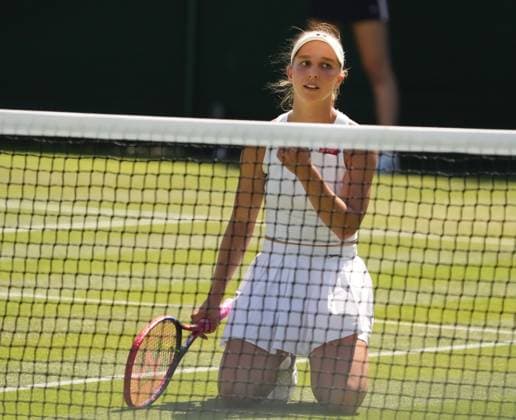 Sport Themen der Woche KW27 Sport Bilder des Tages Tennis - 2023 Wimbledon Championships - Week One - Day Five - All England lawn Tennis & Racquet Club, Wimbledon - Friday 7th Ladies singles - Natalija Stevanovic (SRB) Nikola Cacic (SRB) v Tamara Korpatsch (GRE) Tamara Korpatsch (GRE) drops to her knees after losing a point 