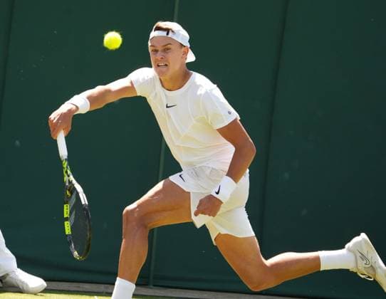 Tennis - 2023 Wimbledon Championships - Week One - Day Five - All England lawn Tennis & Racquet Club, Wimbledon - Friday 7th Mens singles - Roberto Carballes Baena (ESP) Holger Rune (DEN) Holger Rune 