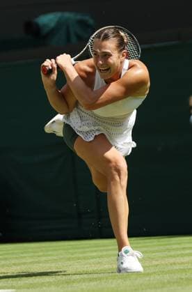 Belarussian Arnya Sabalenka plays a backhand in her second round match against France s Varvara Gracheva on day five of the 2023 Wimbledon championships in London on Friday, July 07, 2023.  LON2023070740 HUGOxPHILPOTT