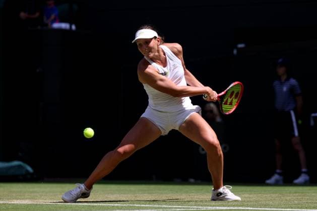 7th July 2023; All England Lawn Tennis and Croquet Club, London, England: Wimbledon Tennis Tournament; Varvara Gracheva plays a backhand shot to Aryna Sabalenka  ActionPlus12527982 ShaunxBrooks