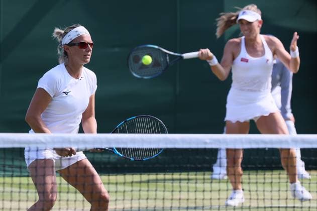 Belgian Kirsten Flipkens and Hungarian Timea Babos pictured during a doubles tennis match between Belgian-Hungarian pair Flipkens-Babos and US-Mexican pair Muhammad-Olmos, in round 1 of the women s doubles at the 2023 Wimbledon grand slam tennis tournament at the All England Tennis Club, in south-west London, Britain, Friday 07 July 2023. BENOITxDOPPAGNE  x70257122x