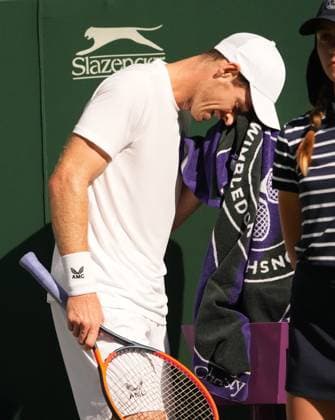 Tennis - 2023 Wimbledon Championships - Week One - Day Five - All England lawn Tennis & Racquet Club, Wimbledon - Friday 7th Mens singles - Andy Murray (GBR) v Stefanos Tsitsipas (GRE) Andy Murray dries his face after losing the 4th set tie break 
