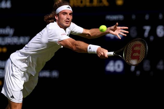 7th July 2023; All England Lawn Tennis and Croquet Club, London, England: Wimbledon Tennis Tournament; Stefanos Tsitsipas returns the serve of Andy Murray  ActionPlus12528097 ShaunxBrooks