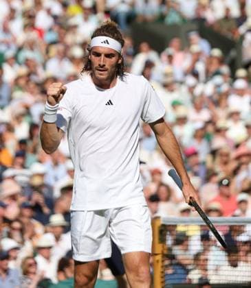 Greek Stefanos Tsitsipas celebrates a point in his second round match against Great Britain s Andy Murray on day five of the 2023 Wimbledon championships in London on Friday, July 07, 2023.  LON2023070777 HUGOxPHILPOTT