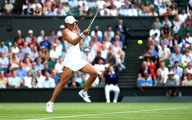 Mandatory Credit: Photo by Simon Dael Shutterstock (13995929gf) Iga Swiatek in action against Petra Martic Wimbledon Tennis Championships, Day 5, The All England Lawn Tennis and Croquet Club, London, UK - 07 Jul 2023 Wimbledon Tennis Championships, Day 5, The All England Lawn Tennis and Croquet Club, London, UK - 07 Jul 2023  Copyright: xSimonxDael Shutterstockx 13995929gf