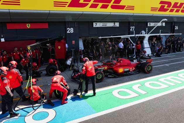 16 LECLERC Charles (mco), Scuderia Ferrari SF-23, action in the pitlane in front of the garage of the APEX APXGP fictional team for the F1 movie by Apple Studios Bruckheimer Films, during the 2023 Formula 1 Aramco British Grand Prix, 10th round of the 2023 Formula One World Championship, WM, Weltmeisterschaft from July 7 to 9, 2023 on the Silverstone Circuit, in Silverstone, United Kingdom - F1 - BRITISH GRAND PRIX 2023 DPPI Panoramic  00123024_AV6_3115 
