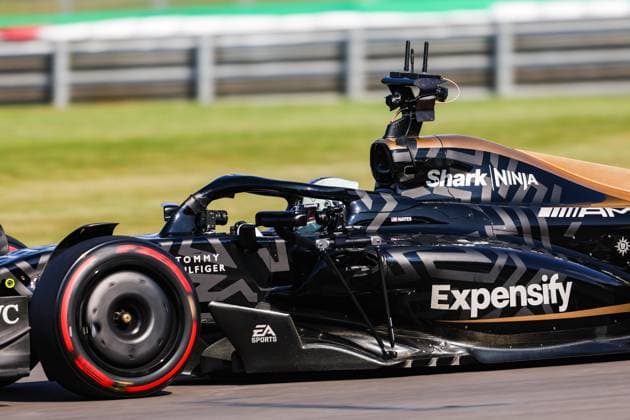 The modified F2 car prepared by Mercedes Applied Science and Carlin driven by the actor Brad Pitt playing HAYES Sonny, for the fictional Apex APXGP team in the F1 movie by Apple Studios Bruckheimer Films, action with onboard film cameras during the 2023 Formula 1 Aramco British Grand Prix, 10th round of the 2023 Formula One World Championship, WM, Weltmeisterschaft from July 7 to 9, 2023 on the Silverstone Circuit, in Silverstone, United Kingdom - F1 - BRITISH GRAND PRIX 2023 DPPI Panoramic  00123024_AV3_4067 