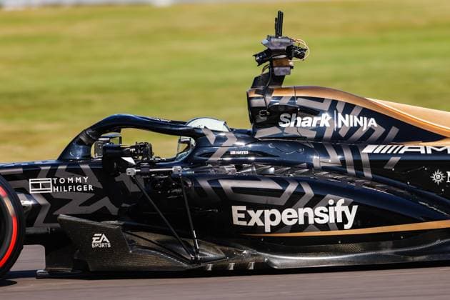 The modified F2 car prepared by Mercedes Applied Science and Carlin driven by the actor Brad Pitt playing HAYES Sonny, for the fictional Apex APXGP team in the F1 movie by Apple Studios Bruckheimer Films, action with onboard film cameras during the 2023 Formula 1 Aramco British Grand Prix, 10th round of the 2023 Formula One World Championship, WM, Weltmeisterschaft from July 7 to 9, 2023 on the Silverstone Circuit, in Silverstone, United Kingdom - F1 - BRITISH GRAND PRIX 2023 DPPI Panoramic  00123024_AV3_4071 