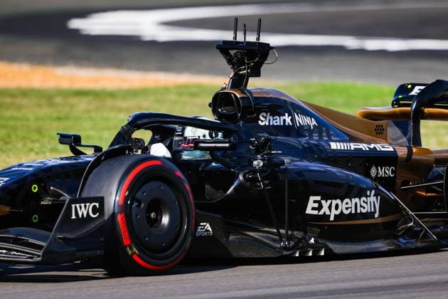 The modified F2 car prepared by Mercedes Applied Science and Carlin driven by the actor Brad Pitt playing HAYES Sonny, for the fictional Apex APXGP team in the F1 movie by Apple Studios Bruckheimer Films, action with onboard film cameras during the 2023 Formula 1 Aramco British Grand Prix, 10th round of the 2023 Formula One World Championship, WM, Weltmeisterschaft from July 7 to 9, 2023 on the Silverstone Circuit, in Silverstone, United Kingdom - F1 - BRITISH GRAND PRIX 2023 DPPI Panoramic  00123024_AV3_4131 