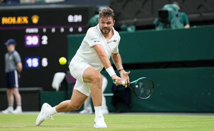 Mandatory Credit: Photo by Dave Shopland Shutterstock (13995926ah) Stan Wawrinka in action against Novak Djokovic Wimbledon Tennis Championships, Day 5, The All England Lawn Tennis and Croquet Club, London, UK - 07 Jul 2023 Wimbledon Tennis Championships, Day 5, The All England Lawn Tennis and Croquet Club, London, UK - 07 Jul 2023  Copyright: xDavexShopland Shutterstockx 13995926ah