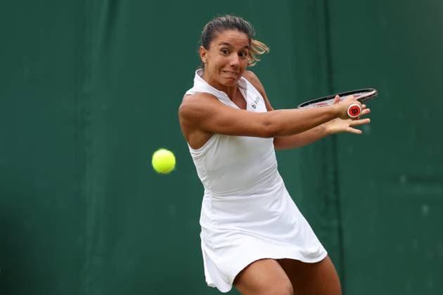 8th July 2023; All England Lawn Tennis and Croquet Club, London, England: Wimbledon Tennis Tournament; Natalija Stevanovic plays a backhand shot to Petra Kvitova  ActionPlus12528432 ShaunxBrooks