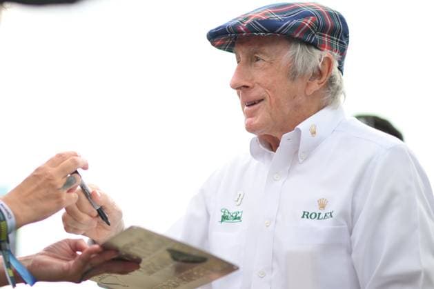 8th July 2023: Silverstone Circuit, Northamptonshire, England: Formula 1 2023 Aramco British F1 Grand Prix: Qualifying Day; Sir Jackie Steward poses for selfies and signs autographs on arrival at Silverstone  ActionPlus12528590 SimonxWest