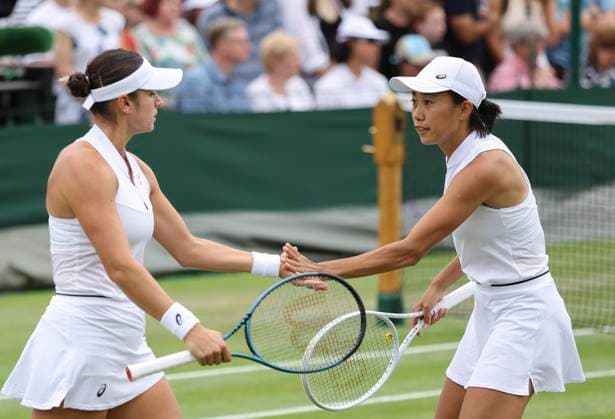 (230708) -- LONDON, July 8, 2023 -- Zhang Shuai (R) Caroline Dolehide celebrate scoring during the women s doubles second round match between Hozumi Eri of Japan Rebeka Masarova of Spain and Zhang Shuai of China Caroline Dolehide of the United States at Wimbledon Tennis Championships in London, Britain, July 8, 2023. ) (SP)BRITAIN-LONDON-TENNIS-WIMBLEDON-DAY 6 HanxYan 