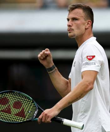 (230708) -- LONDON, July 8, 2023 -- Marton Fucsovics reacts during the men s singles third round match between Daniil Medvedev of Russia and Marton Fucsovics of Hungary at Wimbledon Tennis Championships in London, Britain, July 8, 2023. ) (SP)BRITAIN-LONDON-TENNIS-WIMBLEDON-DAY 6 HanxYan 