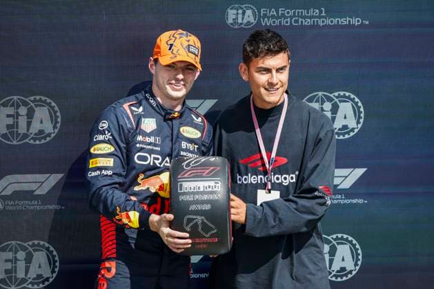 VERSTAPPEN Max (ned), Red Bull Racing RB19, portrait Paulo Dybala football player, portrait pole position during the 2023 Formula 1 Aramco British Grand Prix, 10th round of the 2023 Formula One World Championship, WM, Weltmeisterschaft from July 7 to 9, 2023 on the Silverstone Circuit, in Silverstone, United Kingdom - F1 - BRITISH GRAND PRIX 2023 DPPI Panoramic  00123024__R3_9498A 
