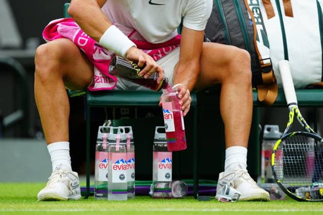 Mandatory Credit: Photo by Javier Garcia Shutterstock (14001532fg) Carlos Alcaraz mixing drinks between games during his third round match Wimbledon Tennis Championships, Day 6, The All England Lawn Tennis and Croquet Club, London, UK - 08 Jul 2023 Wimbledon Tennis Championships, Day 6, The All England Lawn Tennis and Croquet Club, London, UK - 08 Jul 2023  Copyright: xJavierxGarcia Shutterstockx 14001532fg