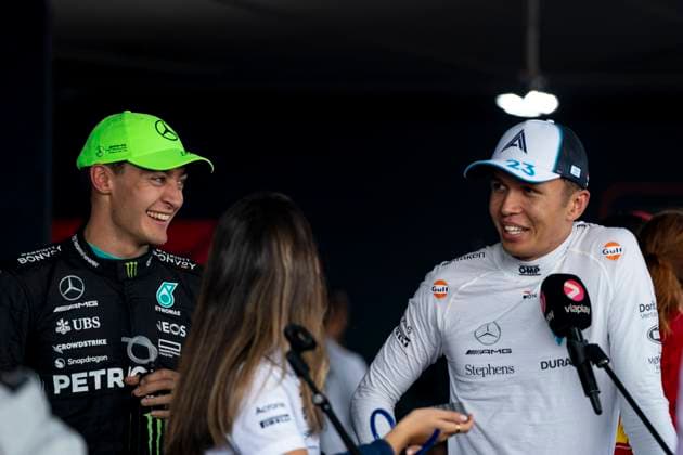 July 8, 2023, Towcester, Great Britain: GEORGE RUSSEL of Great Britain and Mercedes-AMG F1 Team and ALEXANDER ALBON of Thailand and Williams Racing are seen after the qualifying session of the 2023 FIA Formula 1 British Grand Prix at Silverstone Circuit in Towcester, Great Britain. Towcester Great Britain - ZUMAg147 20230708_fap_g147_031 Copyright: xJamesxGasperottix