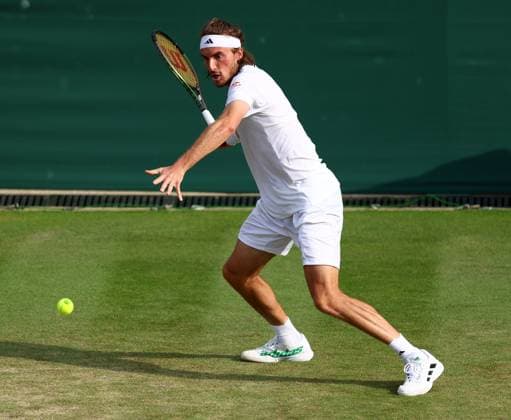 Mandatory Credit: Photo by Simon Dael Shutterstock (14001530dx) Stefanos Tsitsipas during his third round match Wimbledon Tennis Championships, Day 6, The All England Lawn Tennis and Croquet Club, London, UK - 08 Jul 2023 Wimbledon Tennis Championships, Day 6, The All England Lawn Tennis and Croquet Club, London, UK - 08 Jul 2023  Copyright: xSimonxDael Shutterstockx 14001530dx