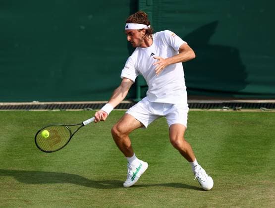 Mandatory Credit: Photo by Simon Dael Shutterstock (14001530ds) Stefanos Tsitsipas during his third round match Wimbledon Tennis Championships, Day 6, The All England Lawn Tennis and Croquet Club, London, UK - 08 Jul 2023 Wimbledon Tennis Championships, Day 6, The All England Lawn Tennis and Croquet Club, London, UK - 08 Jul 2023  Copyright: xSimonxDael Shutterstockx 14001530ds