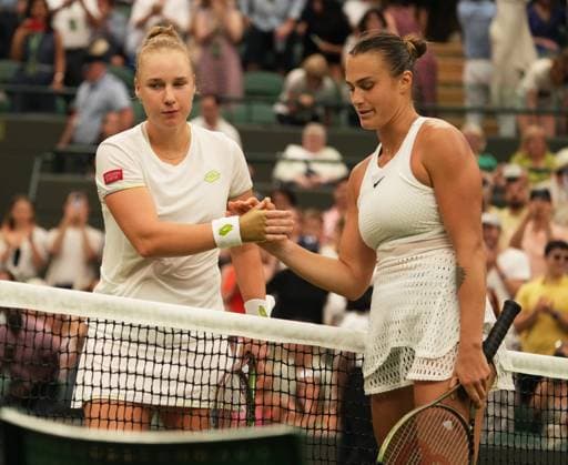 Tennis - 2023 Wimbledon Championships - Week One - Day Six - All England lawn Tennis & Racquet Club, Wimbledon - Saturday 8th Ladies Singles- Anna Blinkova v Aryna Sabalenka Aryna Sabalenka after winning the match with Anna Blinkova at the net 
