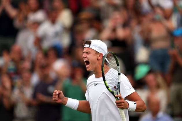 Mandatory Credit: Photo by Ella Ling Shutterstock (14001529bs) Holger Rune celebrates victory in his third round match Wimbledon Tennis Championships, Day 6, The All England Lawn Tennis and Croquet Club, London, UK - 08 Jul 2023 Wimbledon Tennis Championships, Day 6, The All England Lawn Tennis and Croquet Club, London, UK - 08 Jul 2023  Copyright: xEllaxLing Shutterstockx 14001529bs