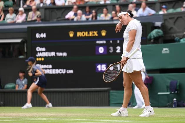 8th July 2023; All England Lawn Tennis and Croquet Club, London, England: Wimbledon Tennis Tournament; Womens singles match of 32, Ons Jabeur versus Bianca Andreescu as Jabeur frustrated at her play  ActionPlus12528807 ShaunxBrooks