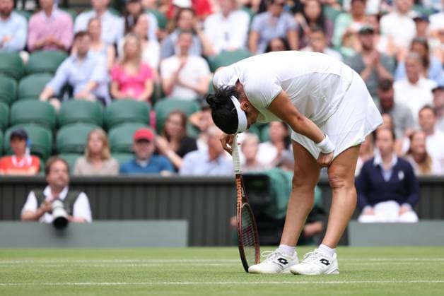 8th July 2023; All England Lawn Tennis and Croquet Club, London, England: Wimbledon Tennis Tournament; Womens singles match of 32, Ons Jabeur versus Bianca Andreescu as Jabeur frustrated at her play  ActionPlus12528809 ShaunxBrooks