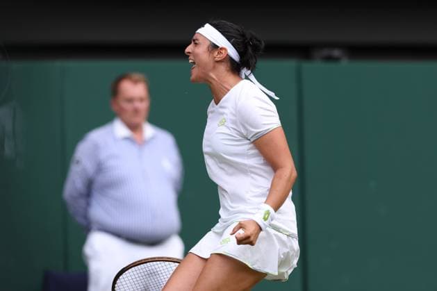 8th July 2023; All England Lawn Tennis and Croquet Club, London, England: Wimbledon Tennis Tournament; Womens singles match of 32, Ons Jabeur versus Bianca Andreescu as Jabeur frustrated at her play  ActionPlus12528814 ShaunxBrooks