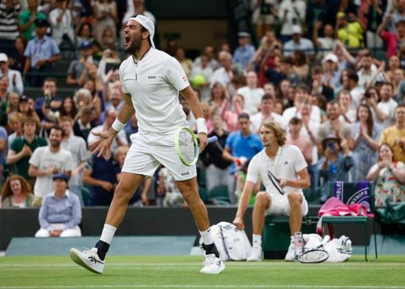 Matteo Berrettini ITA cheers after victory, jubilation, joy, emotion, opponent Alexander Zverev GER in the background Tennis Wimbledon 2023 Grand Slam ITF ATP WTA AELTC London Great Britain 8 July 2023 Copyright: xJuergenxHasenkopfx
