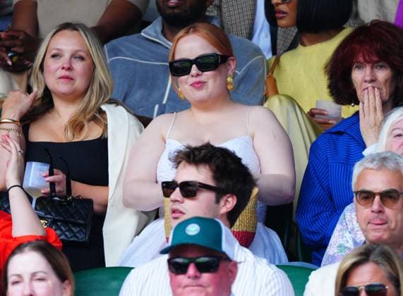 Mandatory Credit: Photo by Javier Garcia Shutterstock (14003010ca) Nicola Coughlan watching the action on Centre Court Wimbledon Tennis Championships, Day 7, The All England Lawn Tennis and Croquet Club, London, UK - 09 Jul 2023 Wimbledon Tennis Championships, Day 7, The All England Lawn Tennis and Croquet Club, London, UK - 09 Jul 2023  Copyright: xJavierxGarcia Shutterstockx 14003010ca