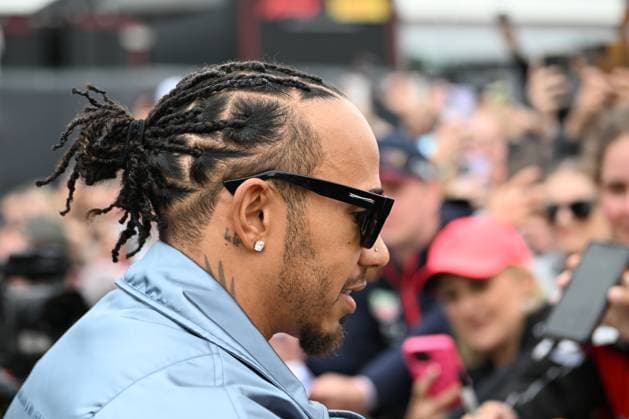 9th July 2023: Silverstone Circuit, Northamptonshire, England: Formula 1 2023 Aramco British F1 Grand Prix: Race Day; Lewis Hamilton of the Mercedes team poses for selfies and signs autographs on arrival at Silverstone  ActionPlus12529133 SimonxWest