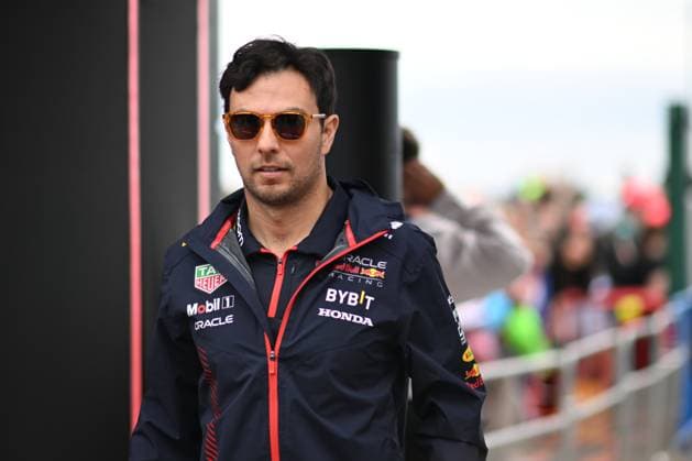 9th July 2023: Silverstone Circuit, Northamptonshire, England: Formula 1 2023 Aramco British F1 Grand Prix: Race Day; Sergio Perez of the Red Bull Racing team arrives at the Silverstone Paddock  ActionPlus12529145 SimonxWest