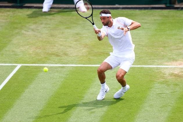 Mandatory Credit: Photo by Simon Dael Shutterstock (14003009bb) Grigor Dimitrov during his third round match Wimbledon Tennis Championships, Day 7, The All England Lawn Tennis and Croquet Club, London, UK - 09 Jul 2023 Wimbledon Tennis Championships, Day 7, The All England Lawn Tennis and Croquet Club, London, UK - 09 Jul 2023  Copyright: xSimonxDael Shutterstockx 14003009bb