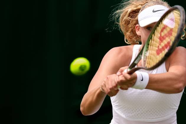 9th July 2023; All England Lawn Tennis and Croquet Club, London, England: Wimbledon Tennis Tournament; Mirra Andreeva plays a backhand shot to Anastasia Potapova  ActionPlus12529231 ShaunxBrooks