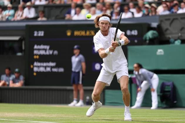 9th July 2023; All England Lawn Tennis and Croquet Club, London, England: Wimbledon Tennis Tournament; Andrey Rublev plays a backhand shot to Alexander Bublik  ActionPlus12529257 ShaunxBrooks