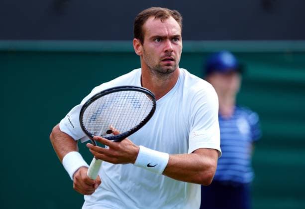 Mandatory Credit: Photo by Javier Garcia Shutterstock (14003010dc) Roman Safiullin during his fourth round match Wimbledon Tennis Championships, Day 7, The All England Lawn Tennis and Croquet Club, London, UK - 09 Jul 2023 Wimbledon Tennis Championships, Day 7, The All England Lawn Tennis and Croquet Club, London, UK - 09 Jul 2023  Copyright: xJavierxGarcia Shutterstockx 14003010dc