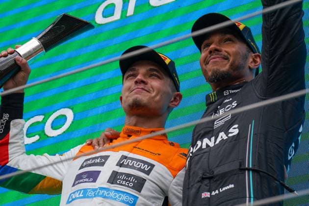 FORMULA 1 ARAMCO BRITISH GRAND PRIX 2023, 09 07 2023 Lando Norris 4 (GBR), McLaren MCL60 and Lewis Hamilton 44 (GBR), Mercedes AMG Petronas W14 on podium during the FORMULA 1 ARAMCO BRITISH GRAND PRIX 2023 at Silverstone Circuit, Silverstone, United Kingdom on 9 July 2023 Editorial Use Only Copyright: xEleanorxHoadx ESM-0747-0022