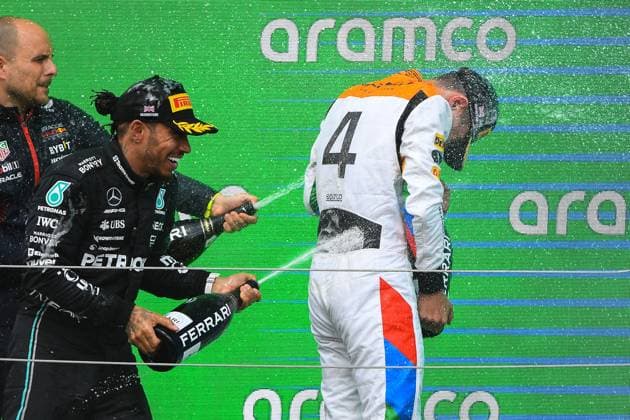 F1 Grand Prix of Great Britain Lewis Hamilton of Great Britain and Mercedes sprays Champagne over Lando Norris of Great Britain and McLaren during the Formula 1 Aramco British Grand Prix at Silverstone Circuit, Towcester, UK on Sunday 9th July 2023. United Kingdom  Copyright: xMIxNewsx originalFilename:fletcher-formula1230709_npd1D.jpg