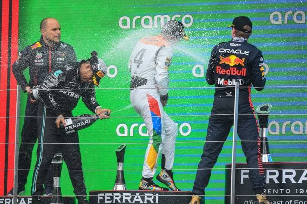 F1 Grand Prix of Great Britain Race winner, Max Verstappen of Oracle Red Bull Racing and 3rd place Lewis Hamilton of Great Britain and Mercedes spray Champagne over Lando Norris of Great Britain and McLaren during the Formula 1 Aramco British Grand Prix at Silverstone Circuit, Towcester, UK on Sunday 9th July 2023. United Kingdom  Copyright: xMIxNewsx originalFilename:fletcher-formula1230709_nprTs.jpg
