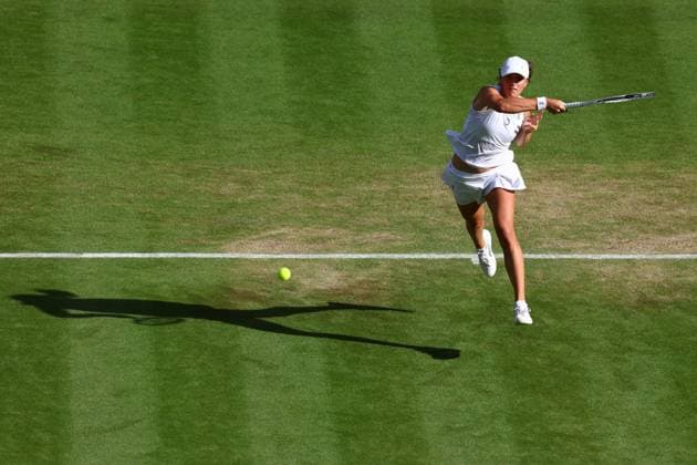 Mandatory Credit: Photo by Simon Dael Shutterstock (14003009ef) Belinda Bencic during her fourth round match Wimbledon Tennis Championships, Day 7, The All England Lawn Tennis and Croquet Club, London, UK - 09 Jul 2023 Wimbledon Tennis Championships, Day 7, The All England Lawn Tennis and Croquet Club, London, UK - 09 Jul 2023  Copyright: xSimonxDael Shutterstockx 14003009ef